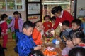 CANTON, CHINA Ã¢â¬â CIRCA MARCH 2019: Kids in kindergarten calebrate a birthday. Birthday party in kindergarten. Royalty Free Stock Photo